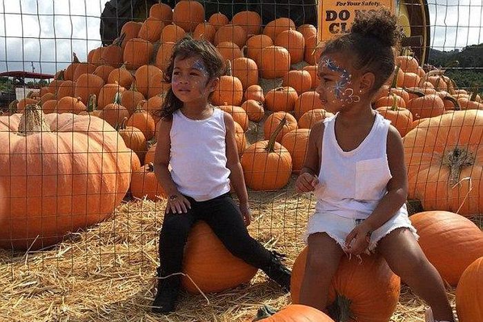 North West and her best friend at a pumpkin patch