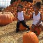 North West and her best friend at a pumpkin patch