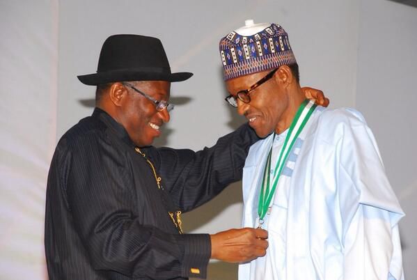 President Muhammadu Buhari and former president Goodluck Jonathan at a peace treaty meeting prior to Nigeria's March 28 and April 11, 2015 general election.