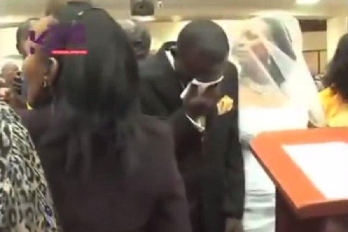 A weeping Pastor John Waituha