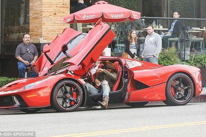 Lewis Hamiton arrives a Beverly Hills restaurant in his  £1.1 million LaFerrari