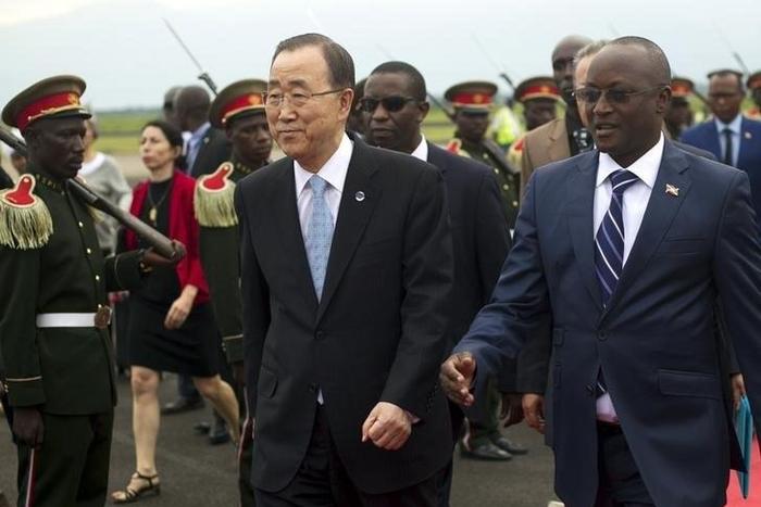 United Nations Secretary-General Ban Ki-moon (L) is escorted on arrival with Burundi's Vice President Gaston Sindimwo at Bujumbura Airport February 22, 2016. Picture taken February 22, 2016. REUTERS/Evrard Ngendakumana