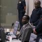 Dominic Ongwen, a former senior rebel commander from the Lord's Resistance Army in Uganda, sits in the courtroom of the International Criminal Court (ICC) during the confirmation of charges in The Hague, the Netherlands January 21, 2016. REUTERS/Michae...