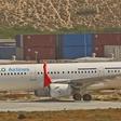 An aircraft belonging to Daallo Airlines is parked at the Aden Abdulle international airport after making an emergency landing following an explosion inside the plane in Somalia's capital Mogadishu, February 3, 2016. REUTERS/Feisal Omar