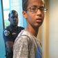 Ahmed Mohammed looking surprised after he was handcuffed