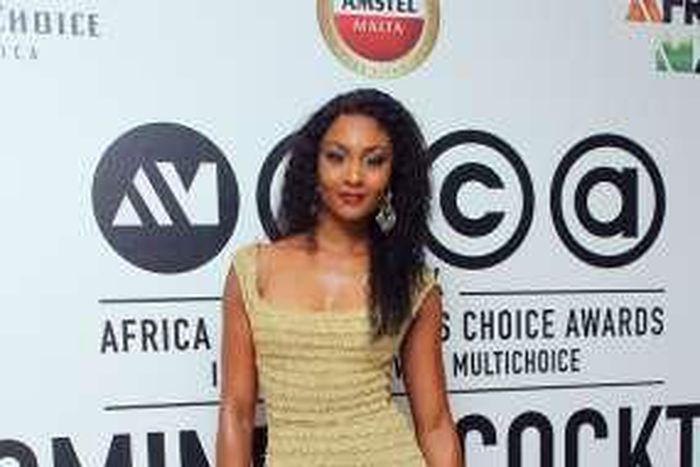 Osas Ighodaro in a form fitting Iamisigo piece
