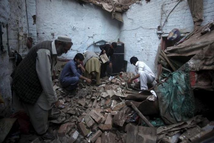 Rescuers race to reach quake zones in Afghanistan, Pakistan as toll nears 300