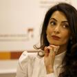Lawyer Amal Clooney listens during a news conference for Mohamed Nasheed, in central London, Britain October 5, 2015. REUTERS/Peter Nicholls
