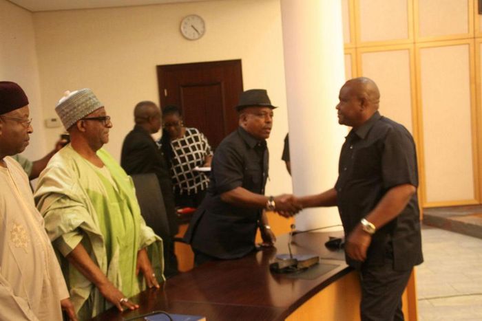 Governor Nyesom Wike exchanges pleasantries with Felix Obuah.