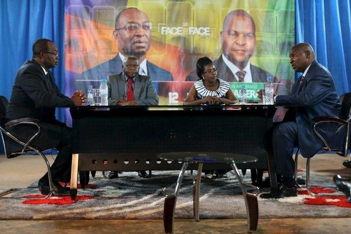 Presidential candidates Faustin-Archange Touadera (right) and Anicet-Georges Dologuele (left) face each other during a live television debate ahead of Sunday's second round election, in Bangui, Central African Republic, February 12, 2016. REUTERS/Siegf...