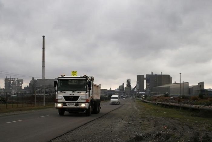 Trucks leave an Anglo American Platinum (AMPLATS) processing plant near Rustenburg in this October 12, 2012 file photo. REUTERS/Mike Hutchings/Files