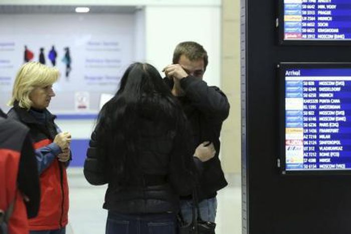 A man reacts next to Russian Emergencies Ministry members at Pulkovo airport in St. Petersburg, Russia, October 31, 2015. A Russian airliner carrying 224 passengers and crew crashed in Egypt"s Sinai peninsula on Saturday, the Egyptian civil aviation au...