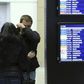 A man reacts next to Russian Emergencies Ministry members at Pulkovo airport in St. Petersburg, Russia, October 31, 2015. A Russian airliner carrying 224 passengers and crew crashed in Egypt"s Sinai peninsula on Saturday, the Egyptian civil aviation au...