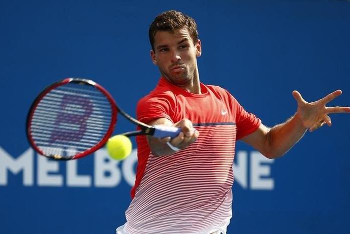 Bulgaria's Grigor Dimitrov hits a shot during his second round match against Argentina's Marco Trungelliti at the Australian Open tennis tournament at Melbourne Park, Australia, January 20, 2016. REUTERS/Thomas Peter