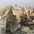 Rescue personnel work on damaged buildings after an earthquake in Tainan, southern Taiwan, February 6, 2016.