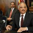 Former U.S. Attorney General Eric Holder talks to the media in Washington March 12, 2015. REUTERS/Yuri Gripas