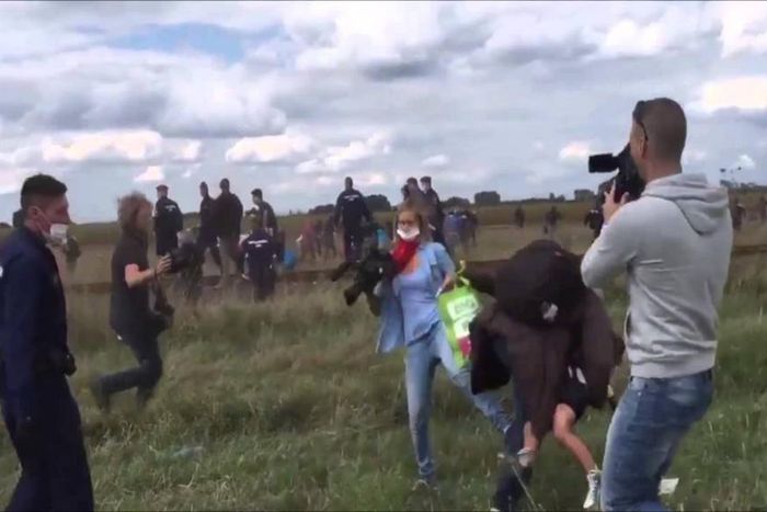 Hungarian TV journalist fired for tripping up fleeing migrants