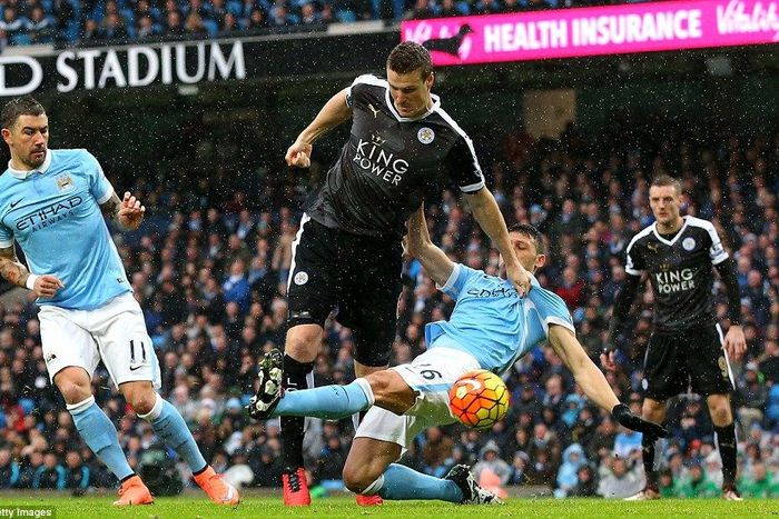 Robert Huth bundles in Leicester City's first goal against Manchester City on  Saturday, February 6