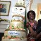 Zimbabwean President Robert Mugabe (R) is helped by his wife Grace (L) and son Chatunga (C) to cut a cake to celebrate his 92nd birthday at State House in Harare, February 22, 2016. Mugabe turned 92 on Sunday. REUTERS/Philimon Bulawayo