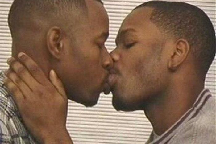 Gay men kissing