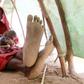 An internally displaced woman feeds her child inside their makeshift shelter structure at the Qansahaley settlement camp in Dollow town along the Somalia-Ethiopia border, August 30, 2011. REUTERS/Thomas Mukoya
