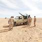 Libyan soldiers stand at a military outpost in Wadi Bey, west of the Islamic State-held city of Sirte, February 23, 2016 REUTERS/Ismail Zitouny
