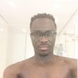 Shirtless selfie of Julius Agwu.