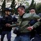 Hong Kong riot police fire warning shots in bloody street clashes