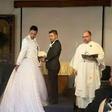 Groom wears dress train on suit for gay wedding