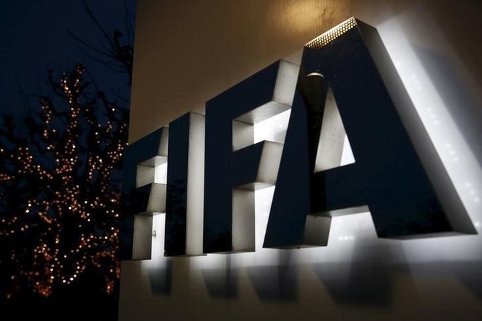 The FIFA logo is seen outside the FIFA headquarters in Zurich, Switzerland, December 17, 2015. REUTERS/Ruben Sprich