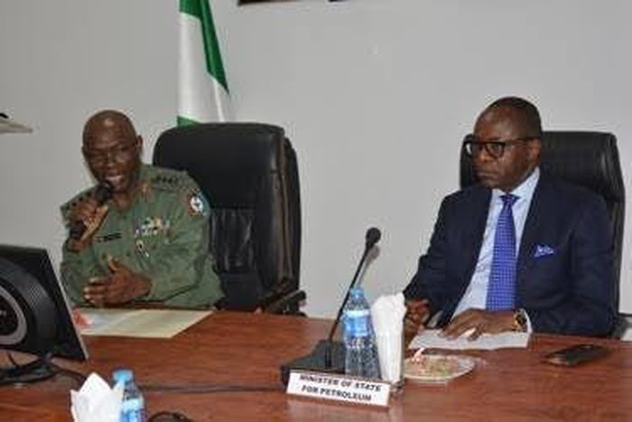 Ibe Kachikwu (right) at the Defence Headquarters in Abuja on Tuesday, February 2, 2016.