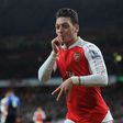Arsenal midfielder, Mesut Ozil celebrates his goal against Bournemouth