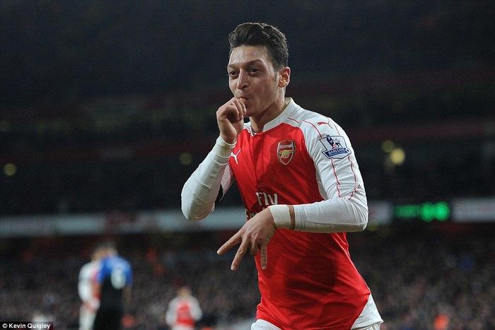 Arsenal midfielder, Mesut Ozil celebrates his goal against Bournemouth