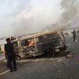 Commercial bus burns killing one