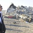 Egypt"s Prime Minister Sherif Ismail looks at the remains of a Russian airliner after it crashed in central Sinai near El Arish city, north Egypt, October 31, 2015.
