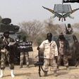 The sect leader Abubakar Shekau, flanked by his subordinates.