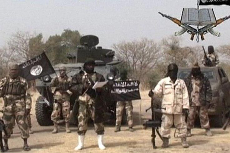 The sect leader Abubakar Shekau, flanked by his subordinates.
