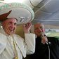 Pope gets shoe shine on Cuba-bound plane