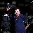 Joaquin "El Chapo" Guzman is escorted by soldiers during a presentation at the hangar belonging to the office of the Attorney General in Mexico City, Mexico January 8, 2016.