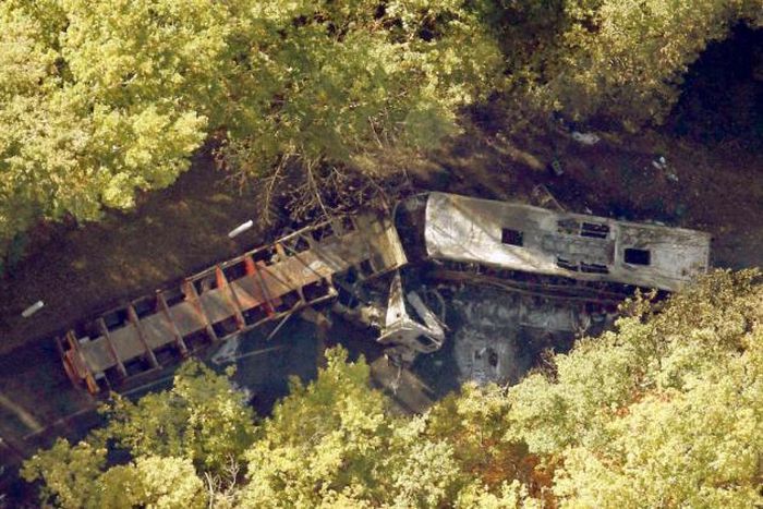 An aerial view of the site where a coach (R) carrying members of an elderly people's club collided with a truck (L) outside Puisseguin near Bordeaux, western France, October 23, 2015.