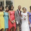 Bridesmaids and their multi colored dresses