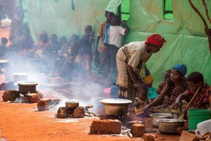 Refugees from Burundi who fled the ongoing violence and political tension are seen at the Nyarugusu refugee camp in western Tanzania in this May 28, 2015 handout photo. EREUTERS/Sala Lewis/PLAN INTERNATIONAL/Handout via Reuters