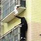 Strangers save child found dangling by its neck from 3rd floor balcony