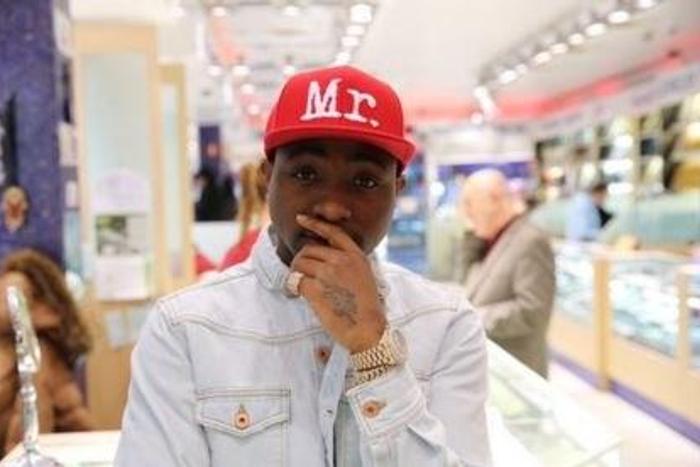 Davido rocking his gold Rolex watch
