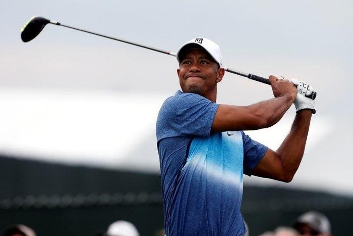 Aug 13, 2015; Sheboygan, WI, USA; Tiger Woods hits his tee shot on the 11th hole during the first round of the 2015 PGA Championship golf tournament at Whistling Straits. Mandatory Credit: Brian Spurlock-USA TODAY Sports