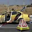 Israeli police explosives experts inspect a taxi at the scene of what police said was an attempted ramming attack near the West Bank Jewish settlement of Kfar Adumim November 22, 2015.