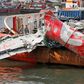 Indonesia investigators say circuit breaker pulled before AirAsia jet crash