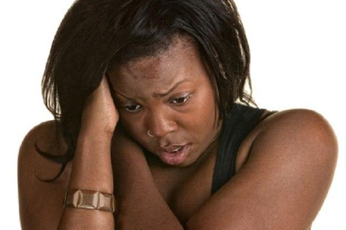 A sad and confused woman needs help