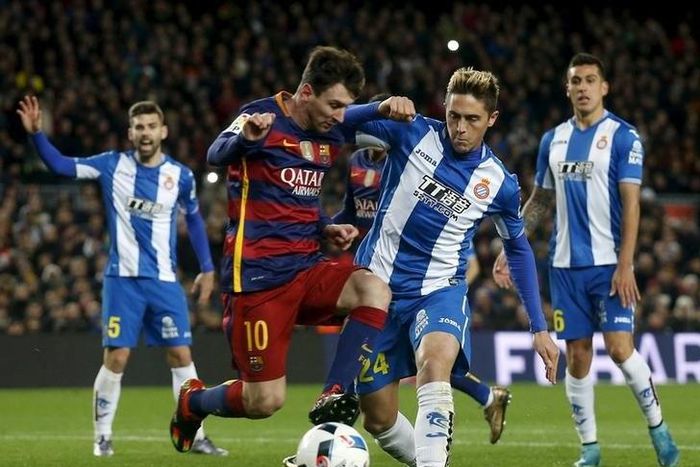 Messi double as Barca beat nine-man Espanyol in Cup