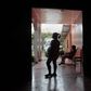 Pregnant teenagers stand at the entrance of a maternity home in Jinotega city, some 160 km (99 miles) north of Managua October 24, 2013. REUTERS/Oswaldo Rivas